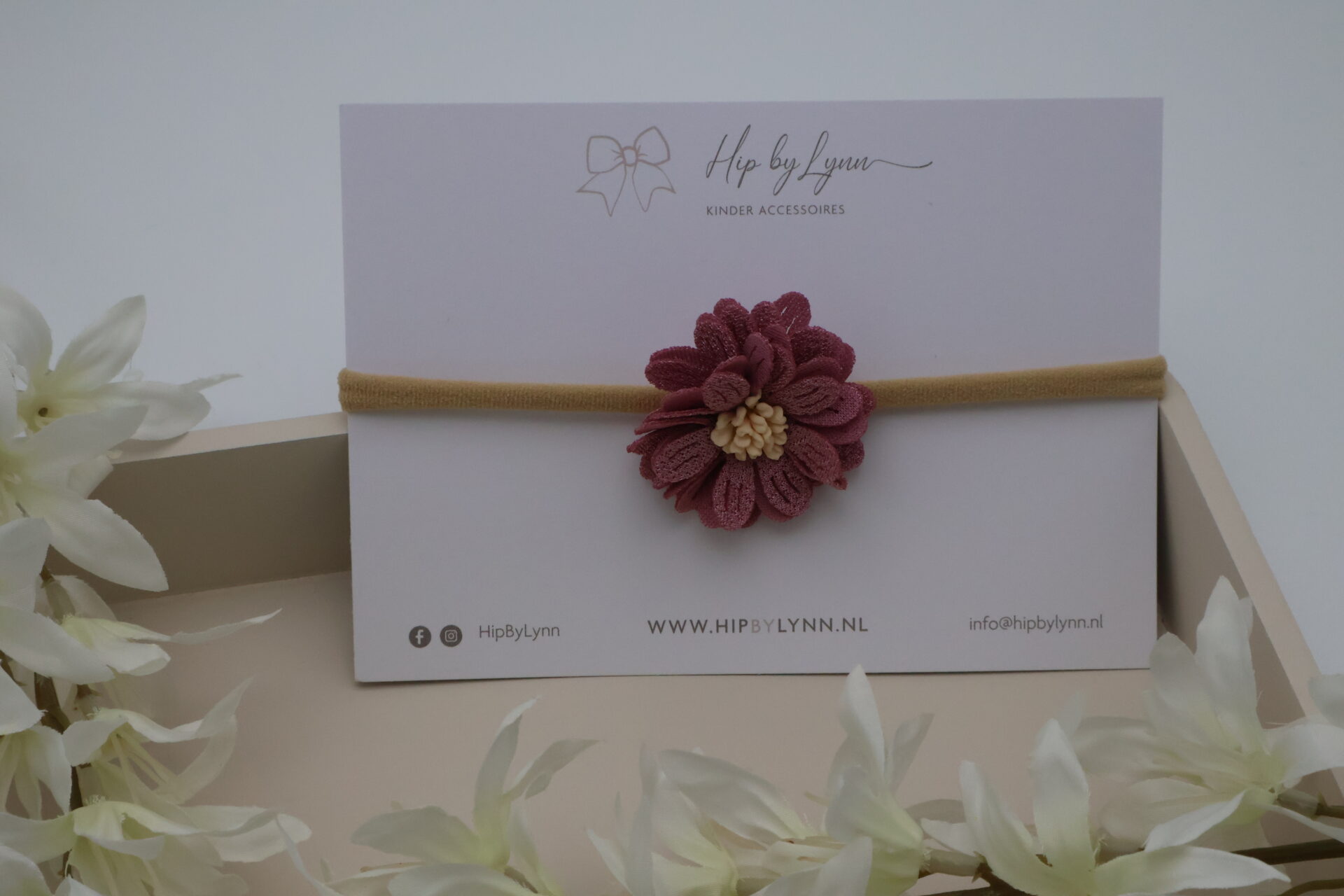 paarse haarband meisje met bloem